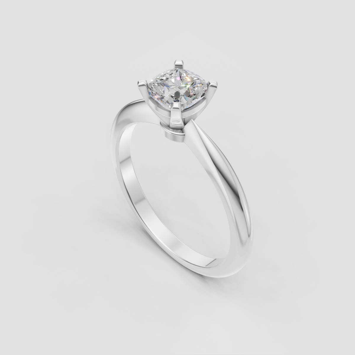 Four-prong cushion Diamond ring with tapered shoulders