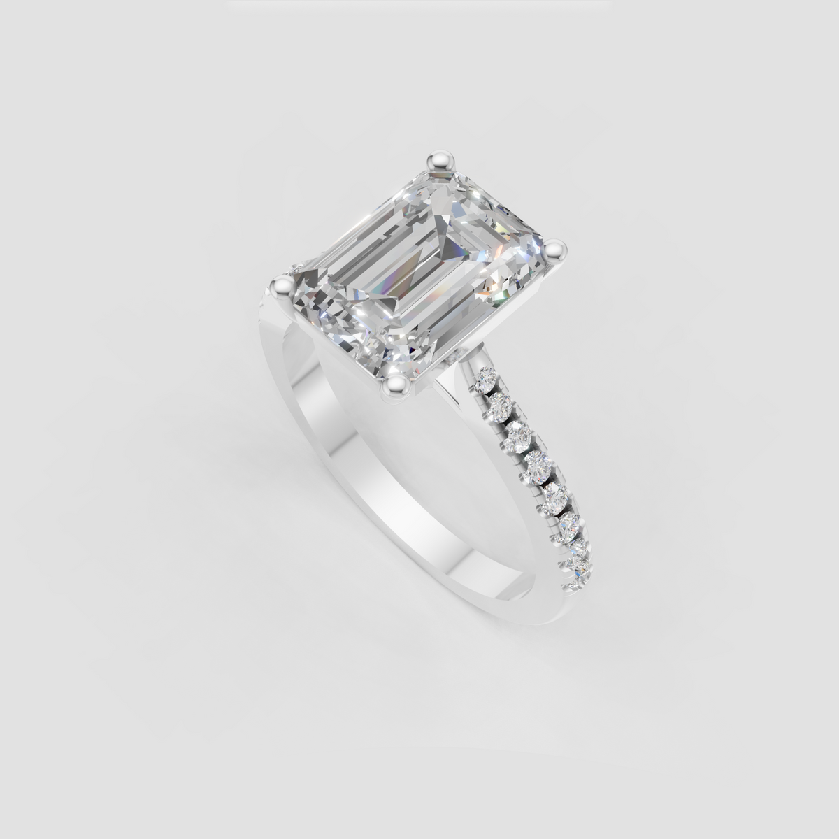 Luxury emerald cut diamond ring with pavé band detailing