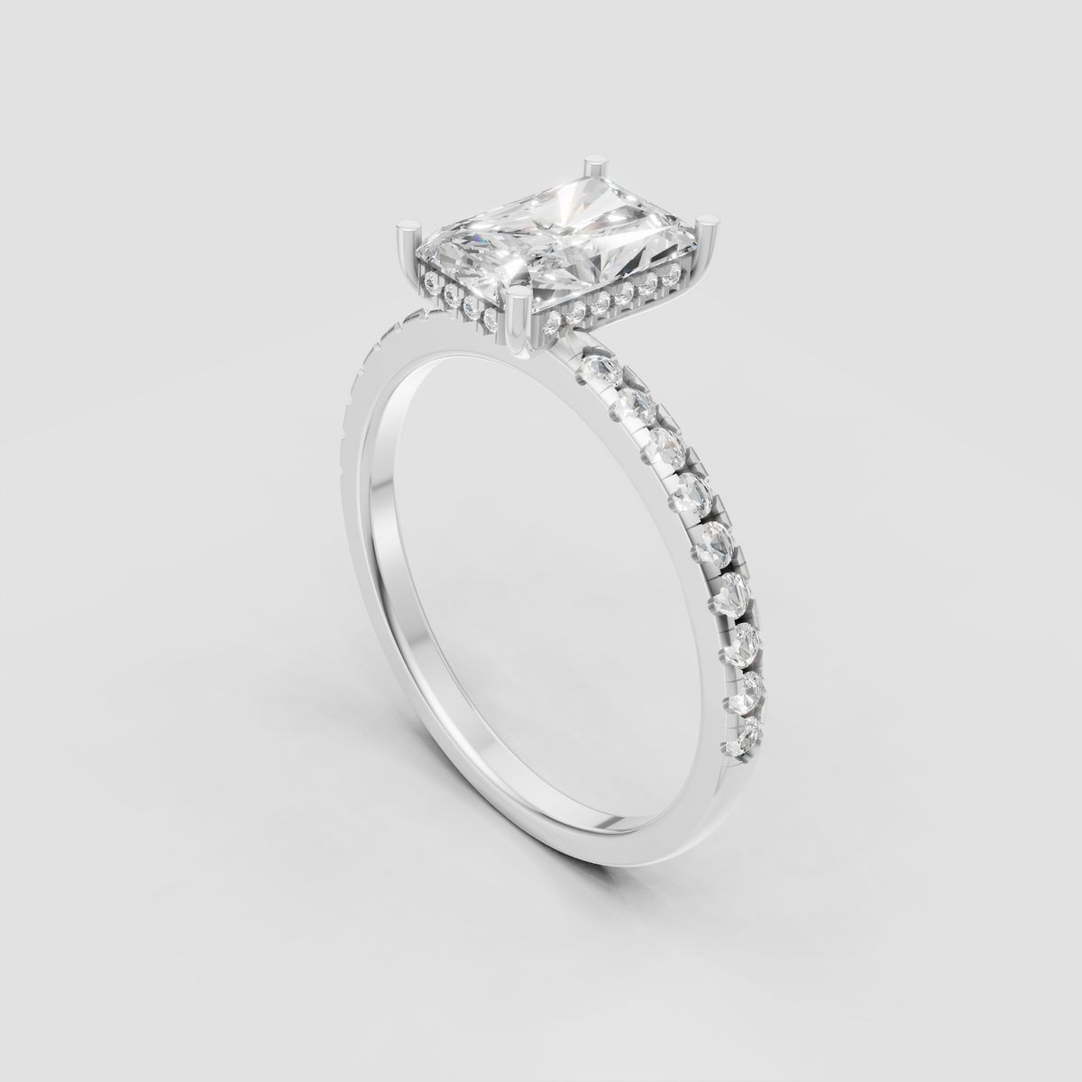 Yellow gold radiant diamond engagement ring with pavé band