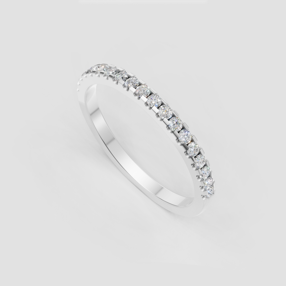 Round diamond stacking ring in shared-prong setting