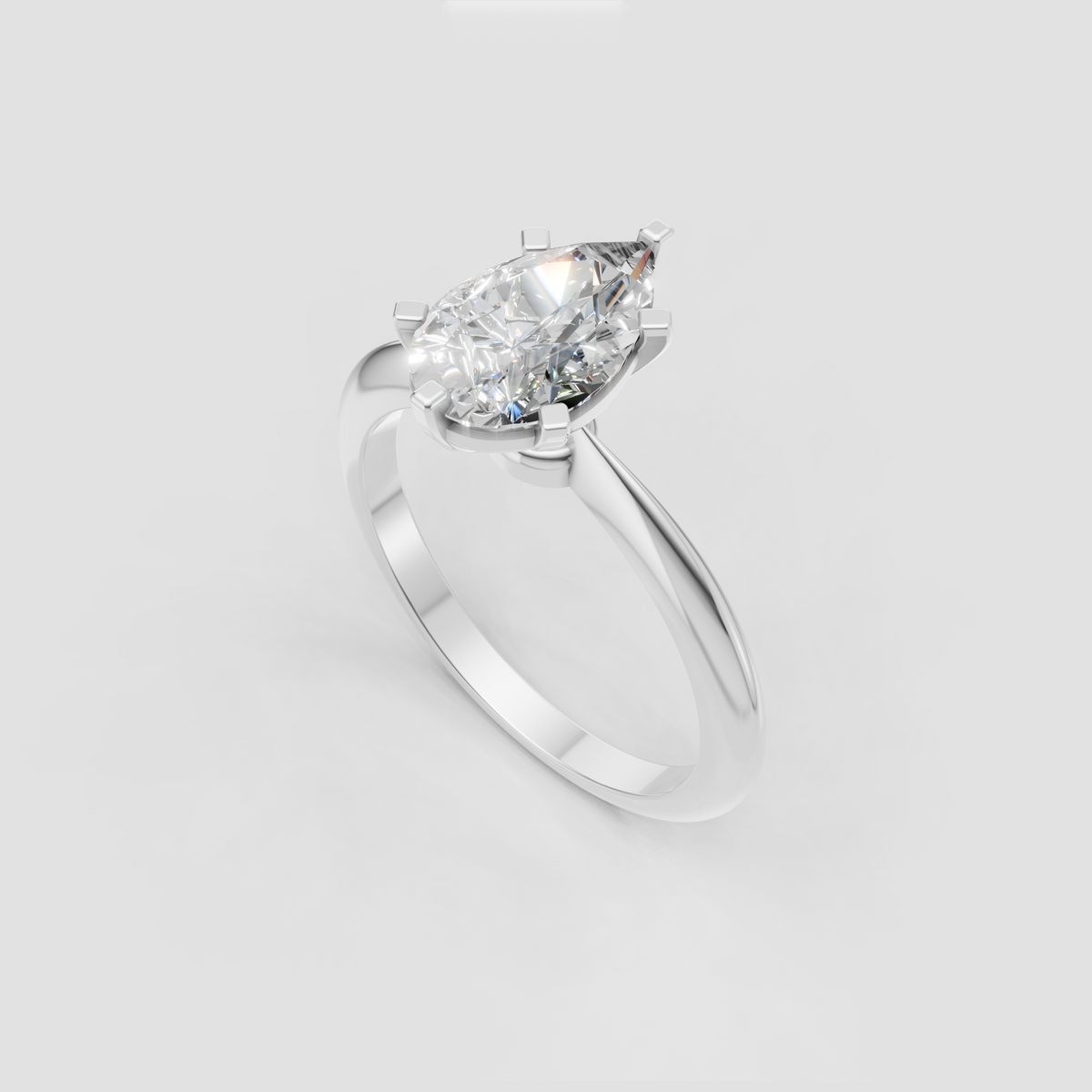 Pear diamond engagement ring with polished six-prong setting