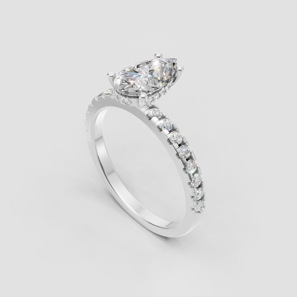 Luxury pear shaped engagement ring with round accent stones