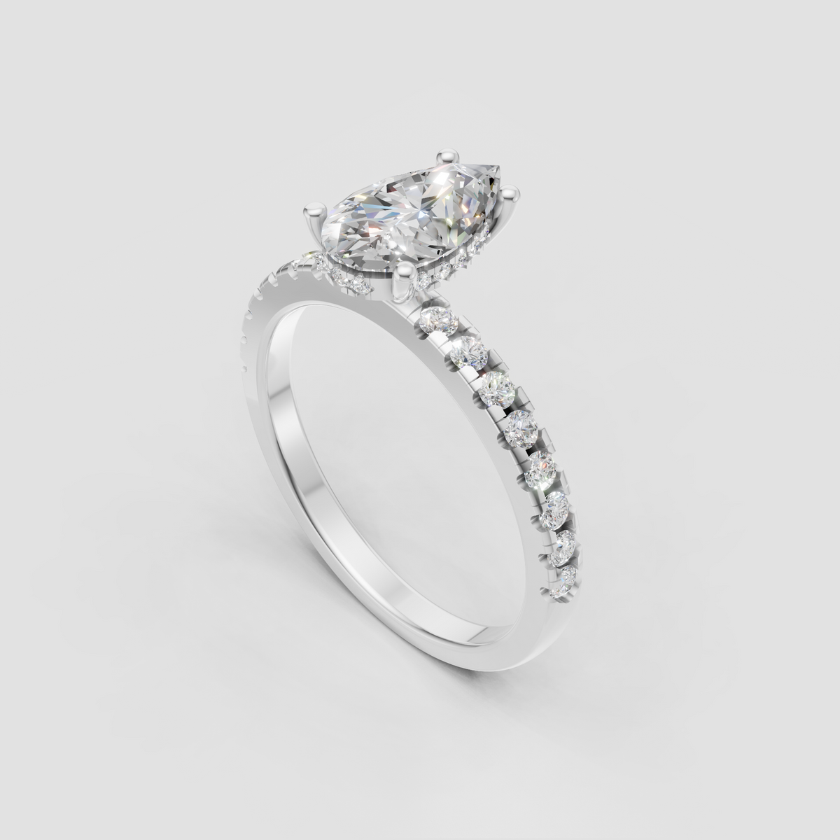 Luxury pear shaped engagement ring with round accent stones