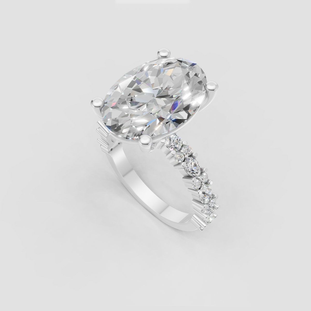 Oval diamond anniversary ring with four-prong basket setting