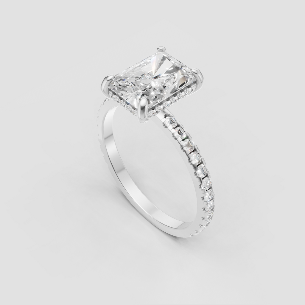 Elongated rectangular diamond ring with slim pave engagement band