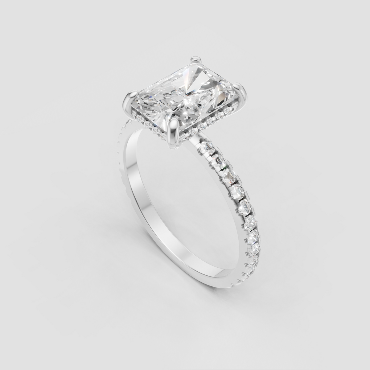 Elongated rectangular diamond ring with slim pave engagement band