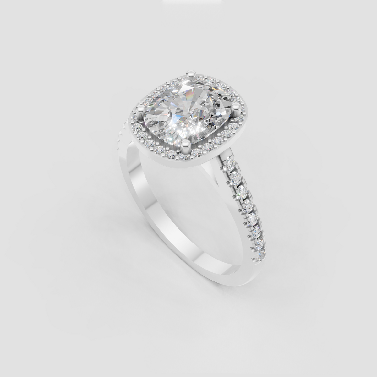 Oval diamond engagement ring with four-prong canter setting