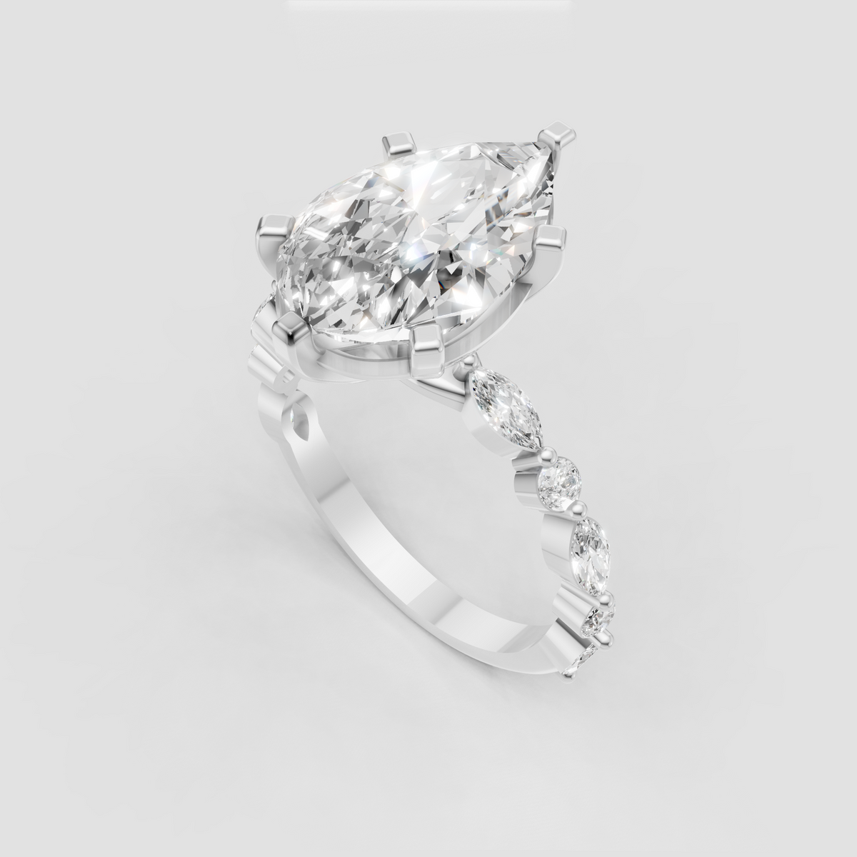 Yellow gold teardrop diamond ring with detailed accent stones