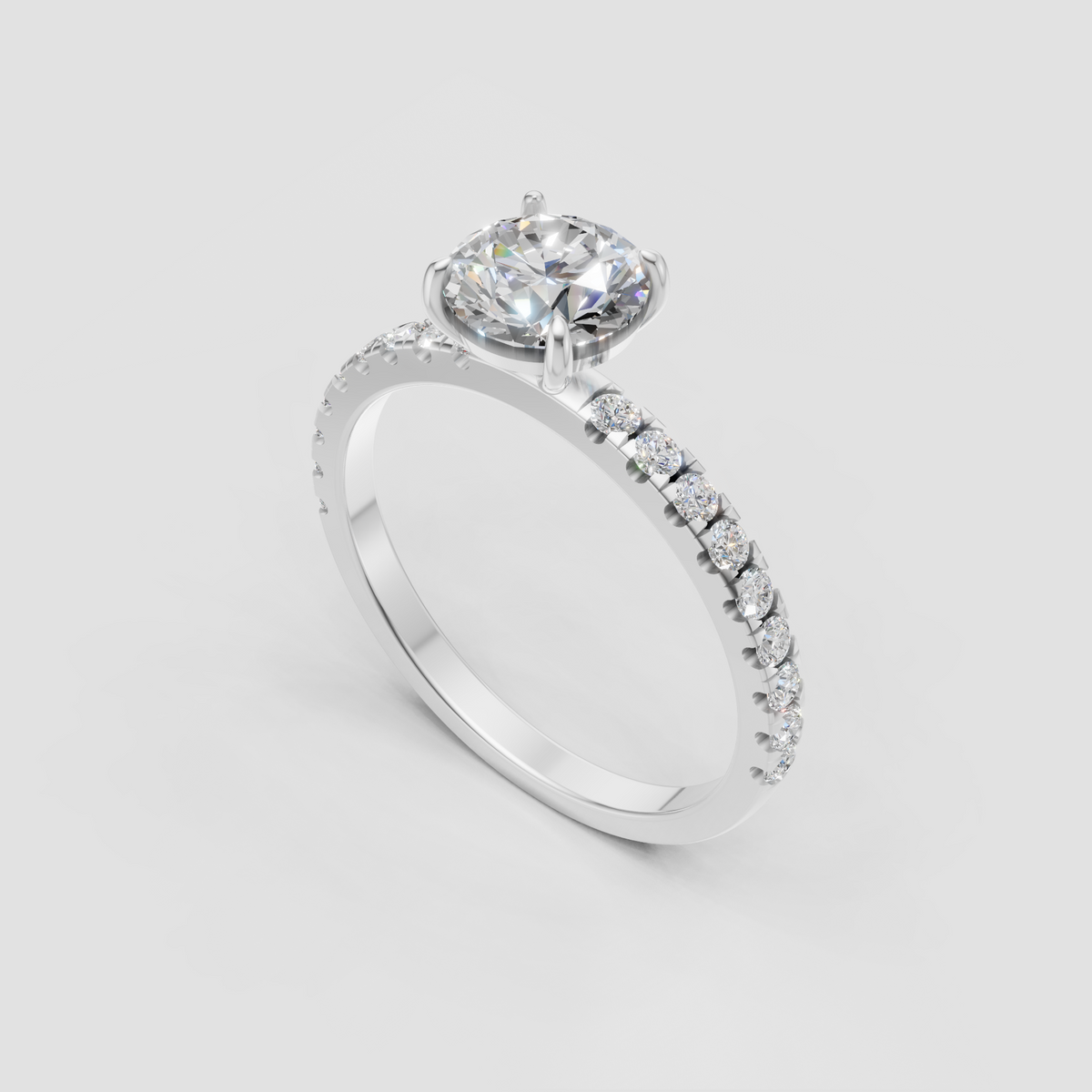 Round cut diamond solitaire ring with pavé half eternity shank