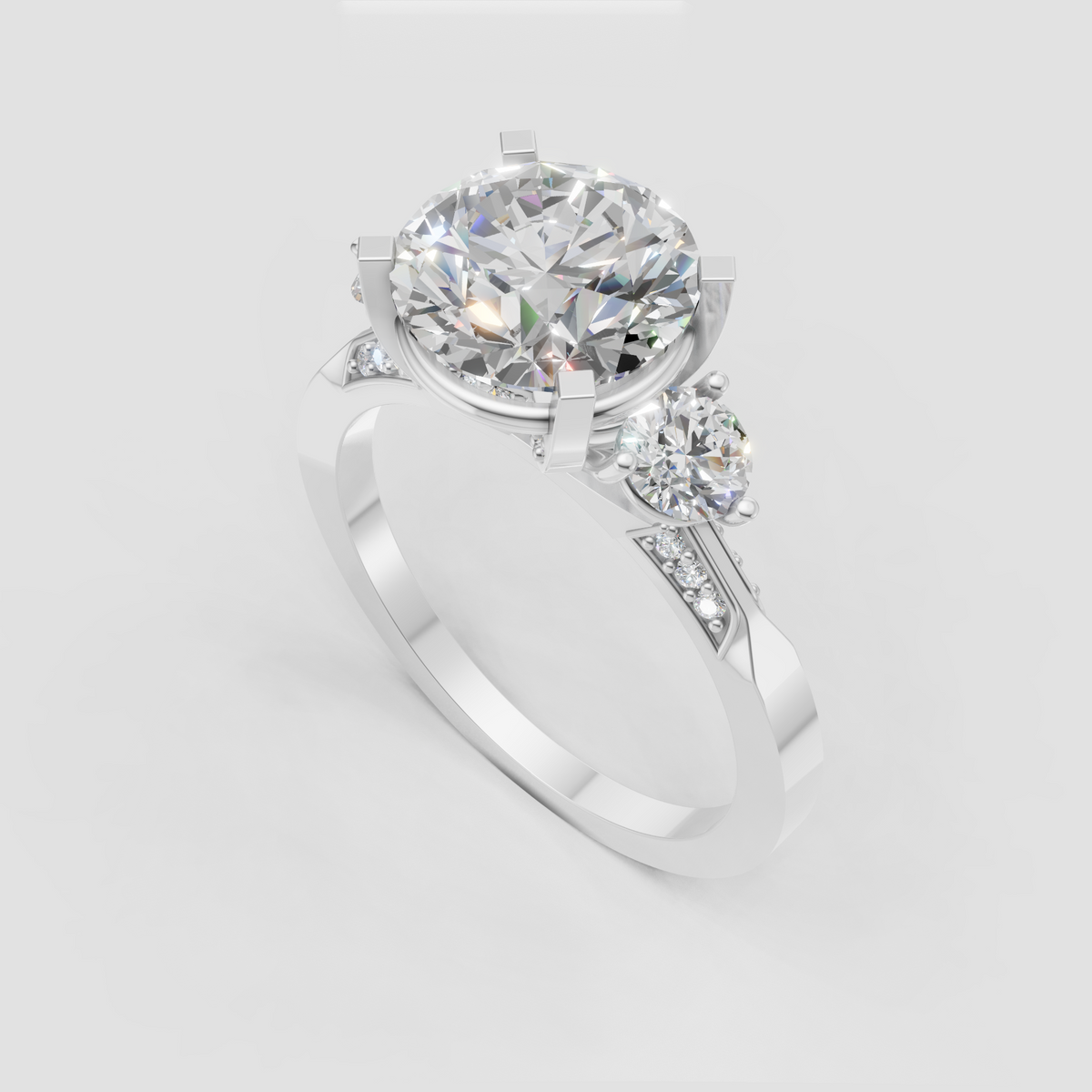 Round diamond three-stone ring featuring bold yellow gold prongs