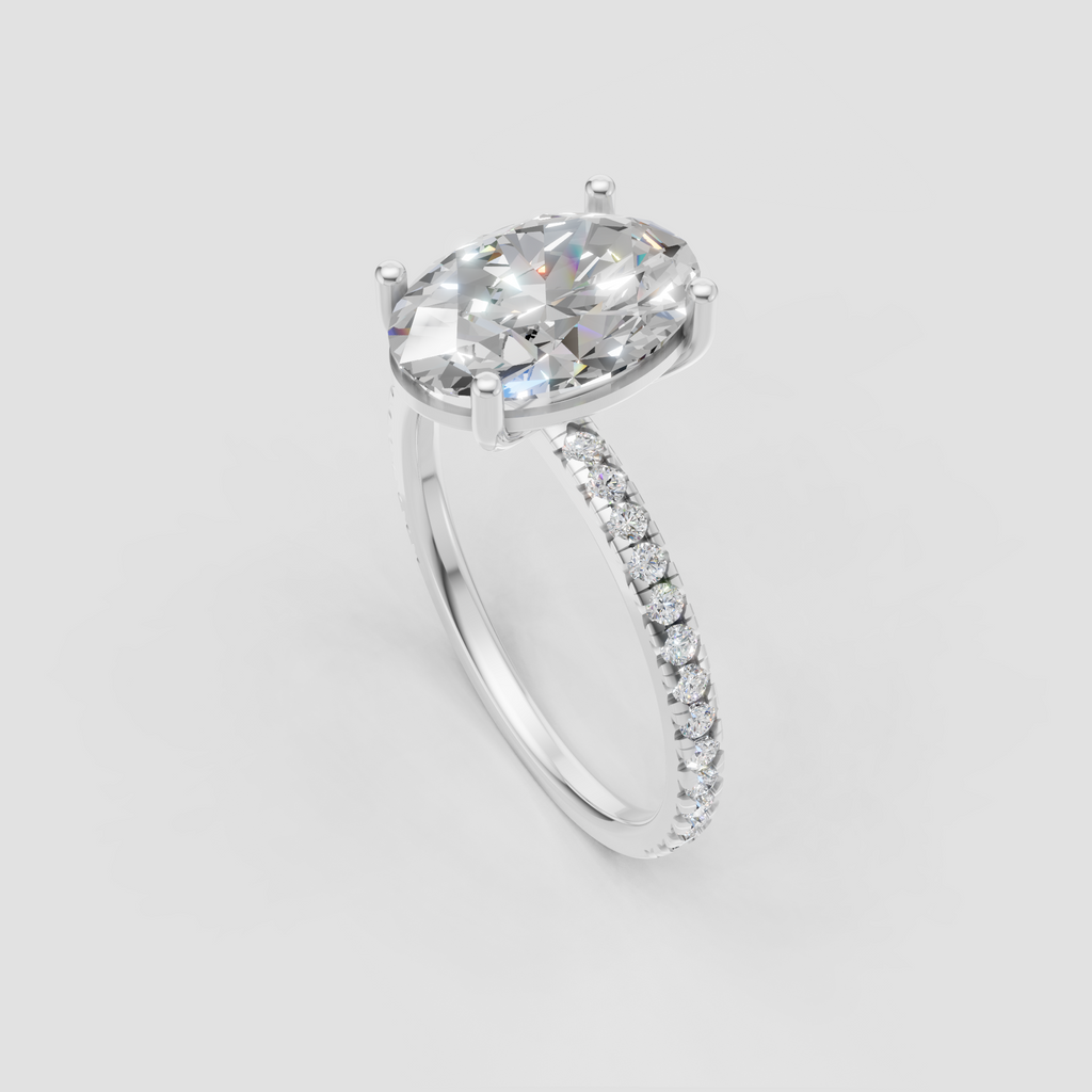 Luxury oval engagement ring with cathedral-style shoulders