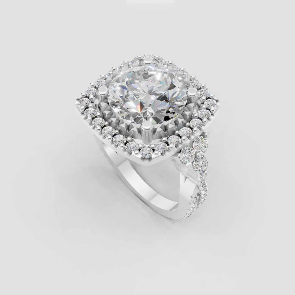 Round diamond halo ring featuring intricate milgrain-inspired detailing