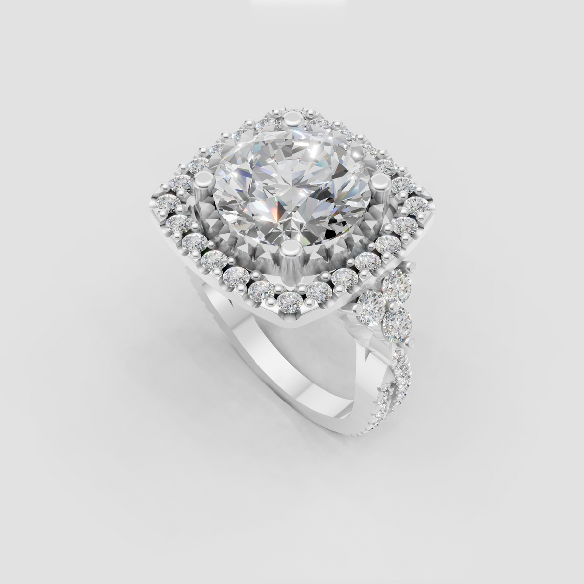 Round diamond halo ring featuring intricate milgrain-inspired detailing