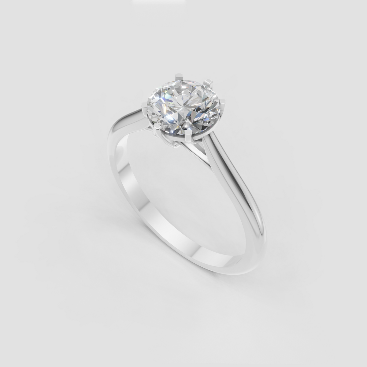 Round brilliant engagement ring in polished yellow gold