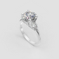 Nature inspired diamond engagement ring with sculpted leaves