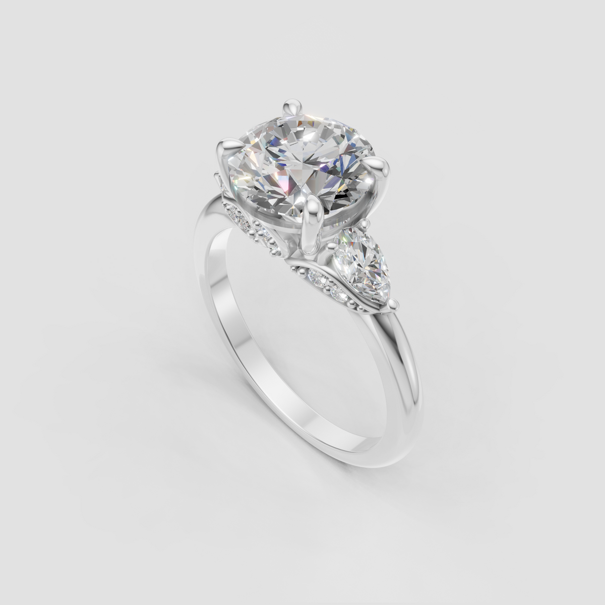 Nature inspired diamond engagement ring with sculpted leaves