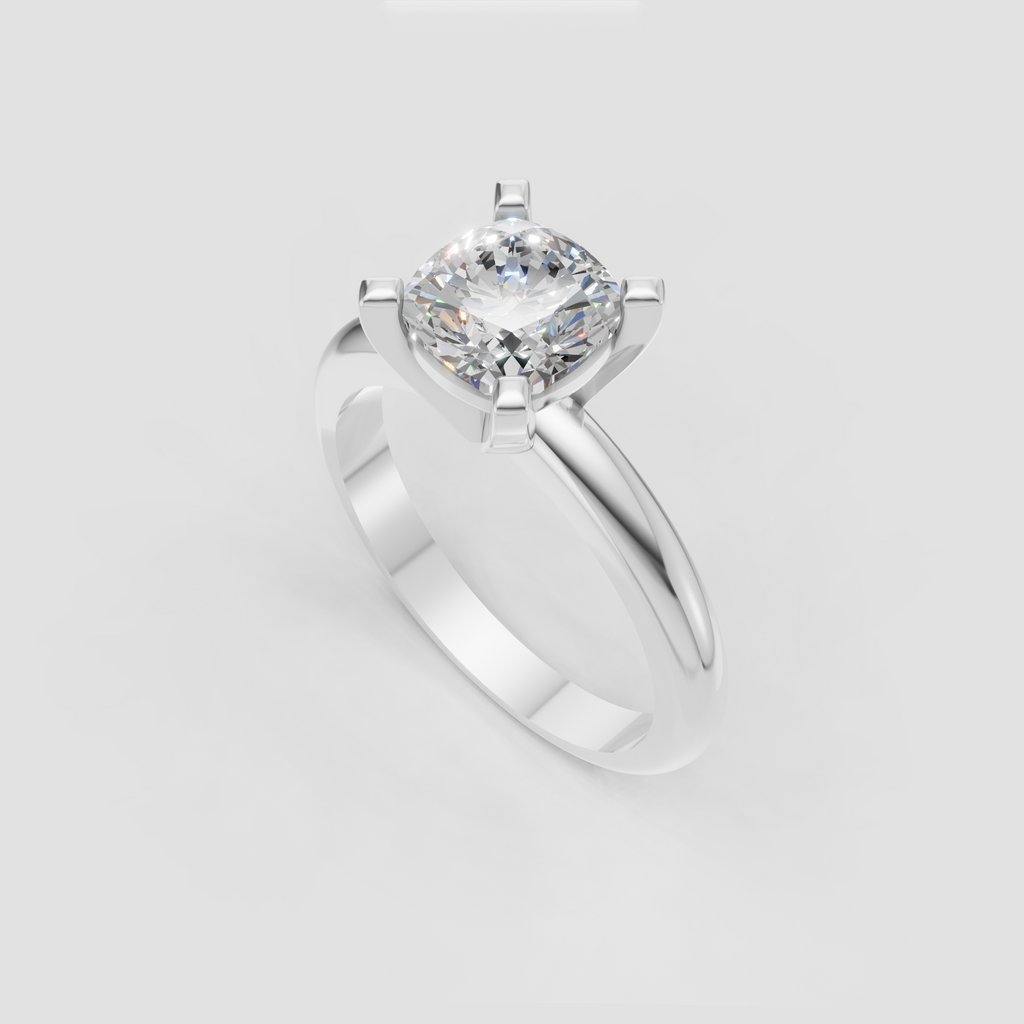 Cushion shaped center diamond in yellow gold setting
