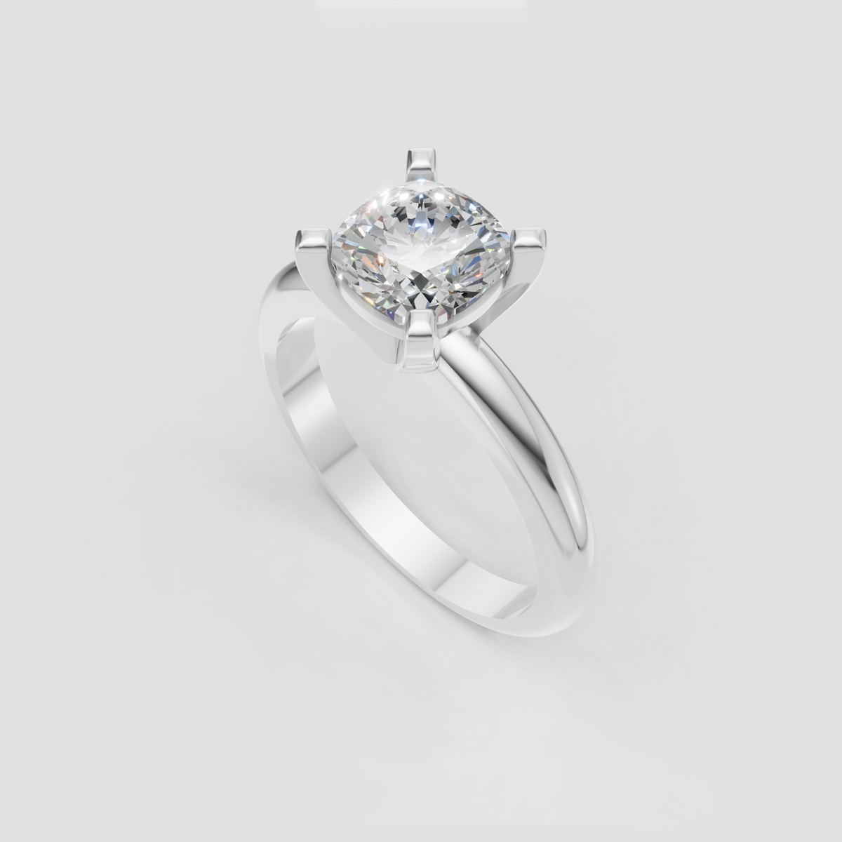 Cushion shaped center diamond in yellow gold setting