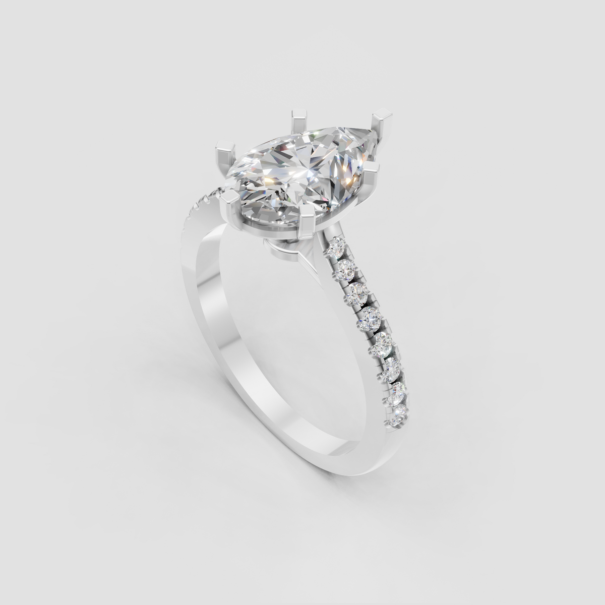 Six-prong pear diamond engagement ring with diamond pavé band