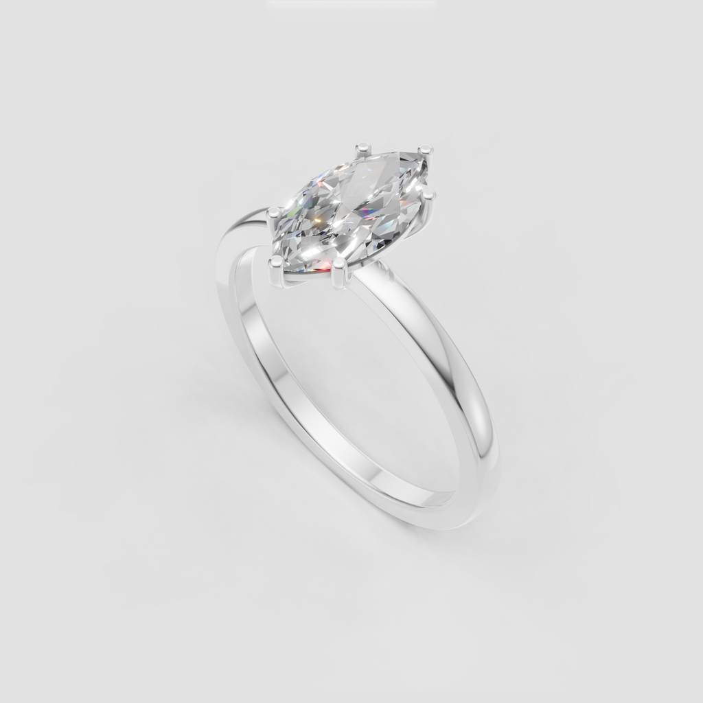 Marquise solitaire ring featuring a polished yellow gold band