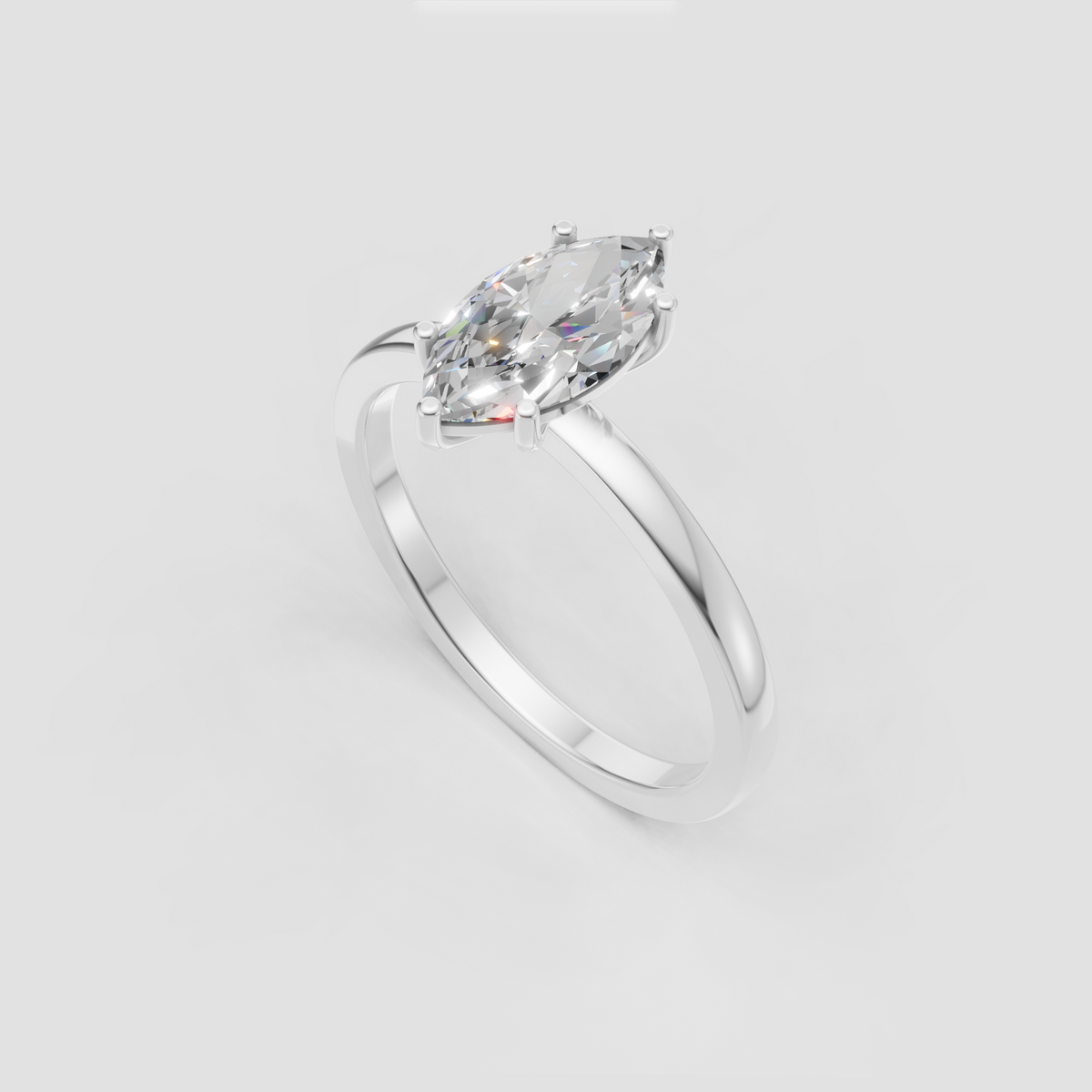Marquise solitaire ring featuring a polished yellow gold band