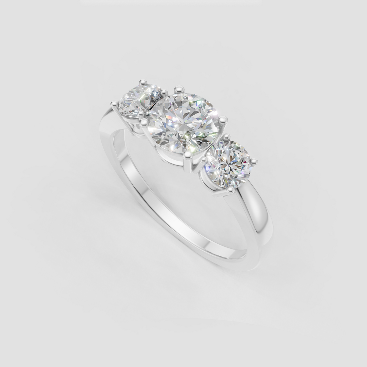 Luxury round-cut Diamond trilogy ring with three-prong-set stones