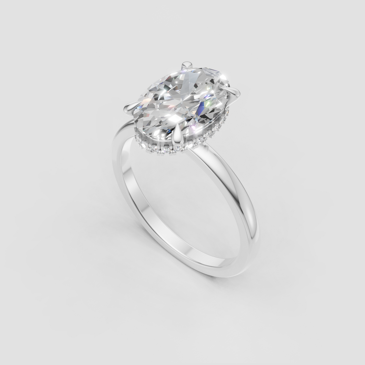 Oval diamond ring with sparkling hidden halo