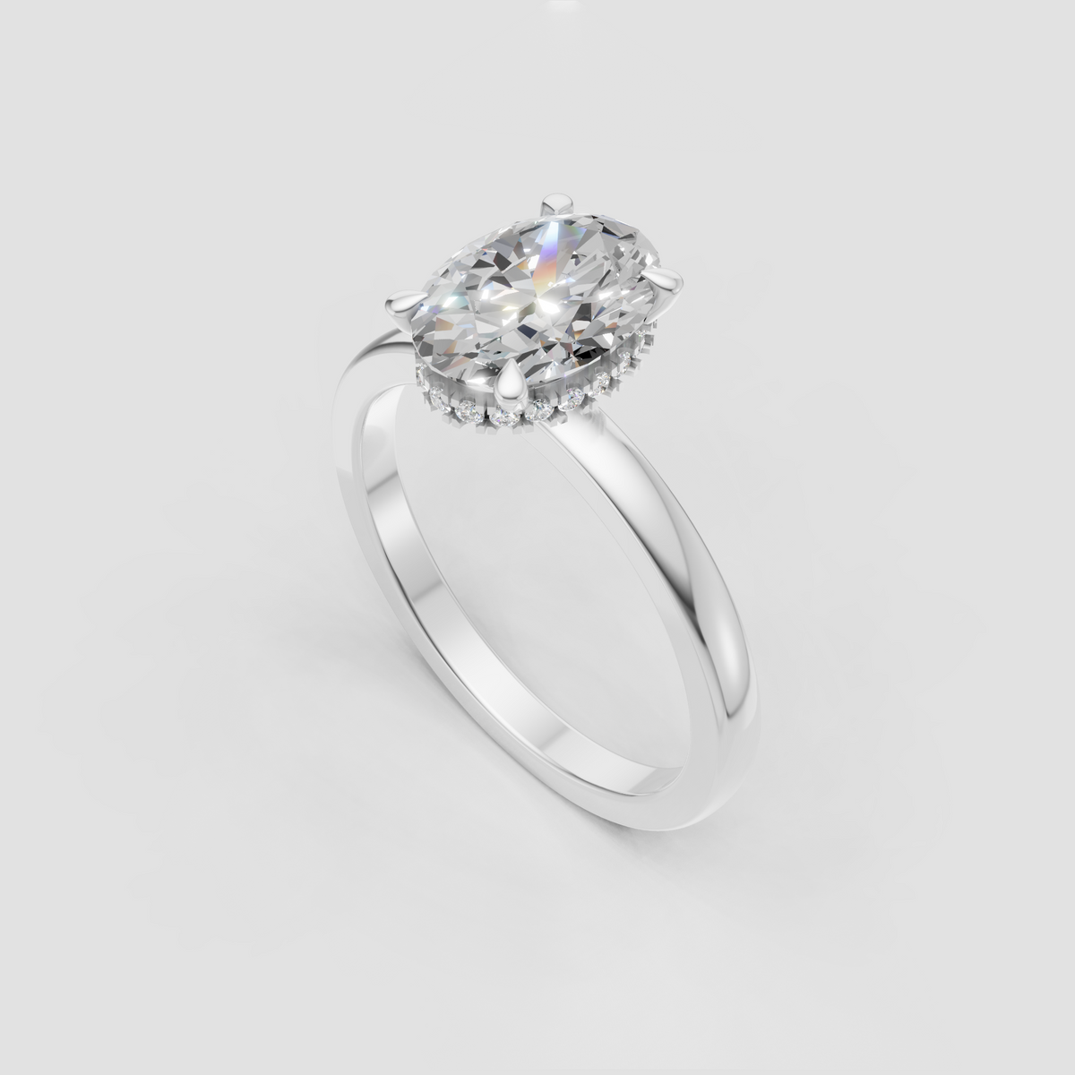 Oval cut center diamond secured by four rounded prongs