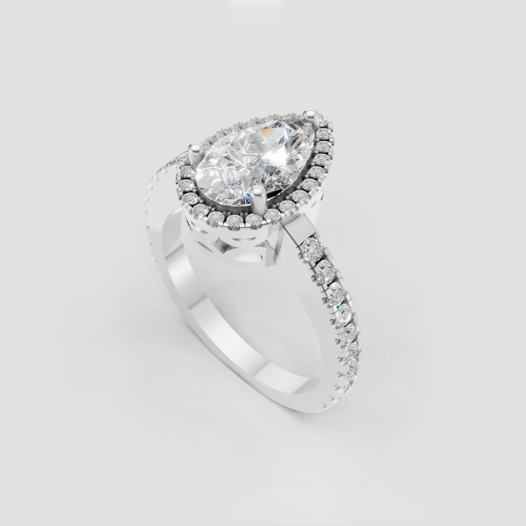 Pear diamond ring featuring a brilliant full halo of accent stones