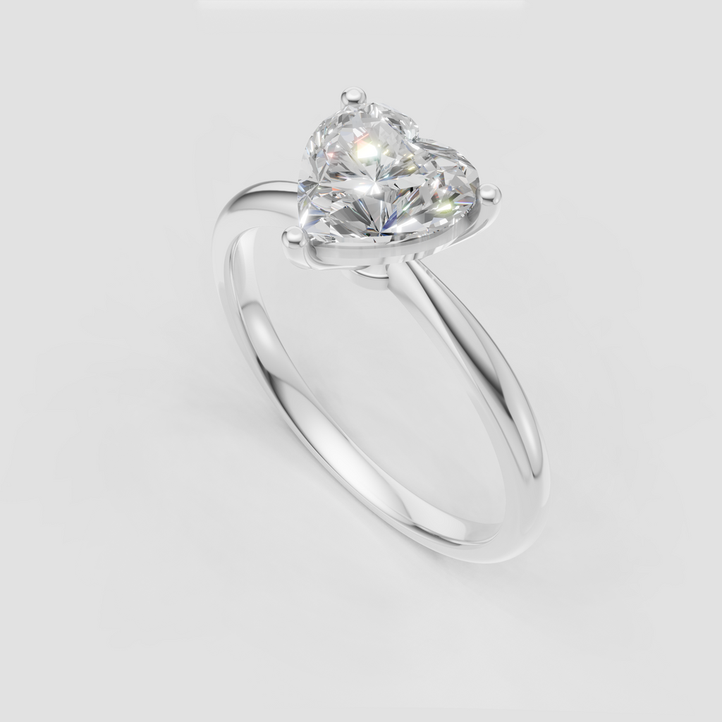 Three prong heart cut diamond engagement ring with classic polished band