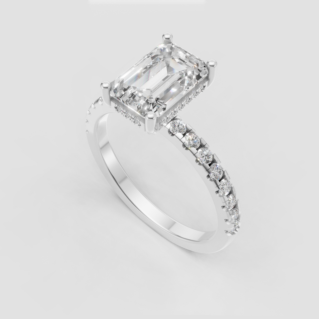 Emerald cut center diamond with hidden halo detailing