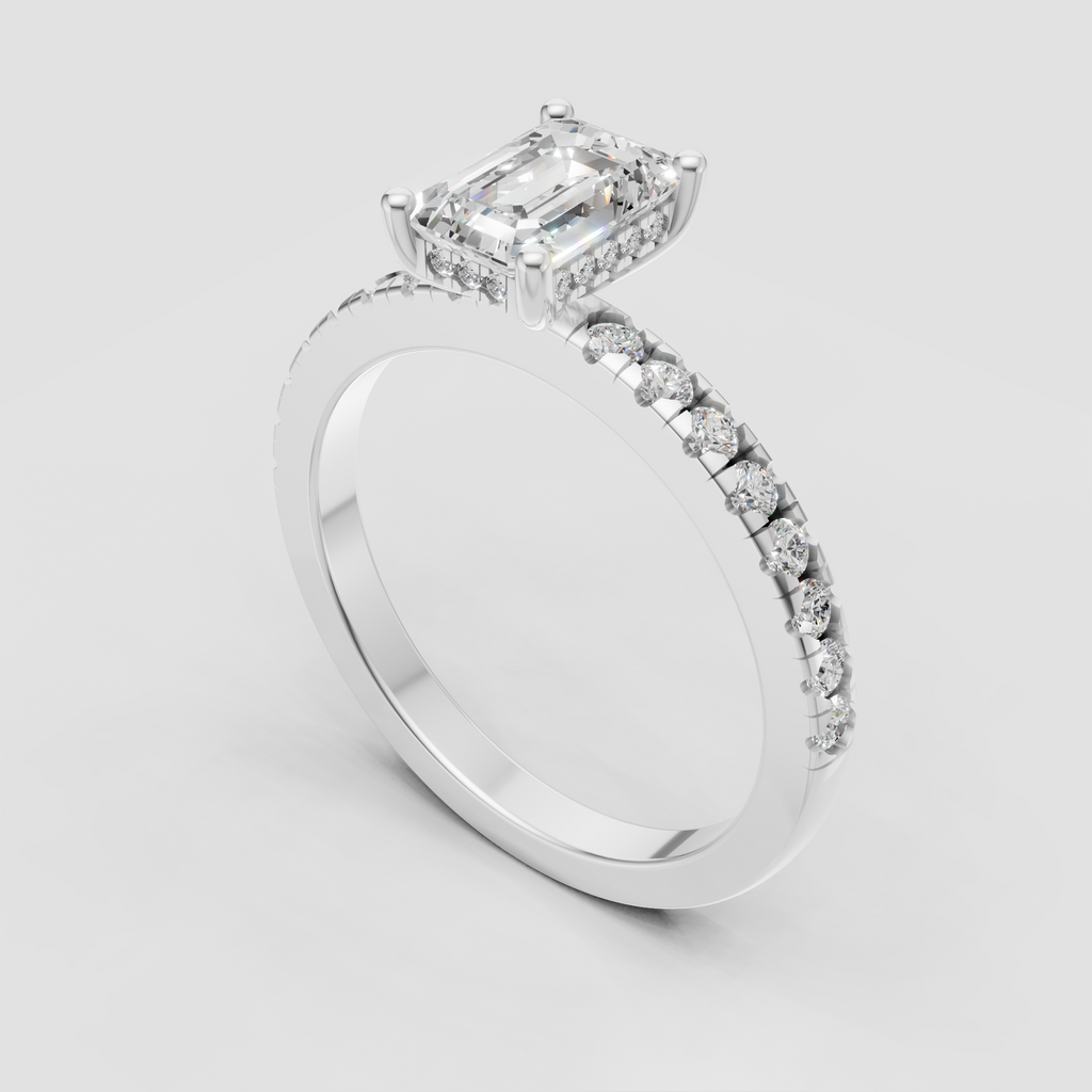 Emerald cut diamond bridal ring with half eternity pave band in yellow gold