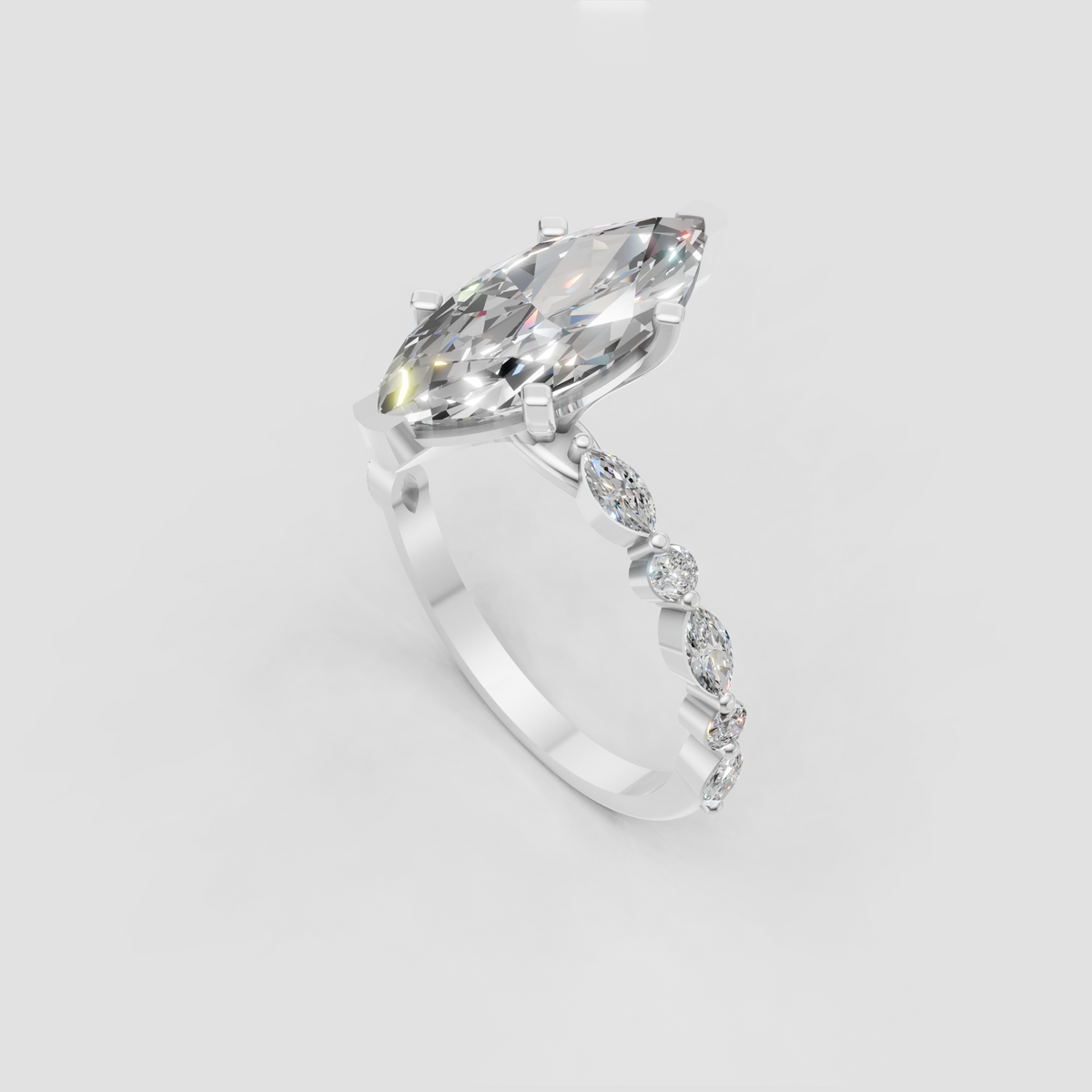 Yellow gold marquise cut diamond engagement ring with four-prong setting.