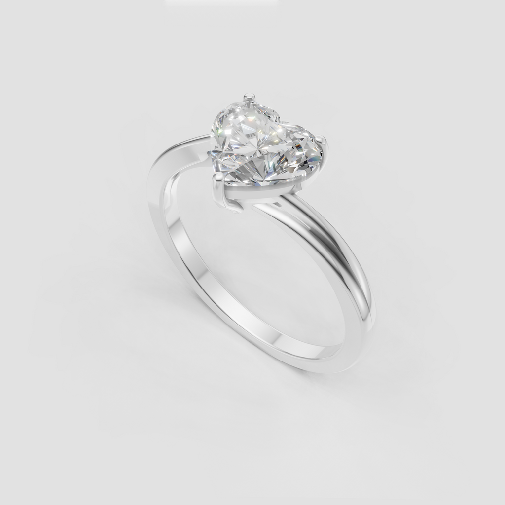 Yellow gold heart cut engagement ring with smooth contemporary band