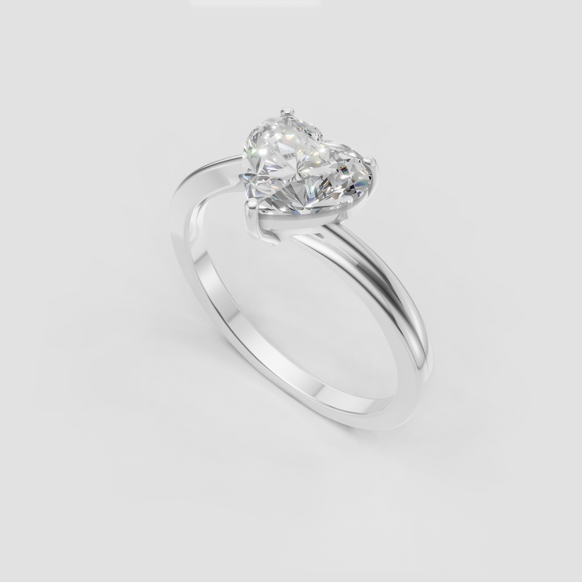 Yellow gold heart cut engagement ring with smooth contemporary band