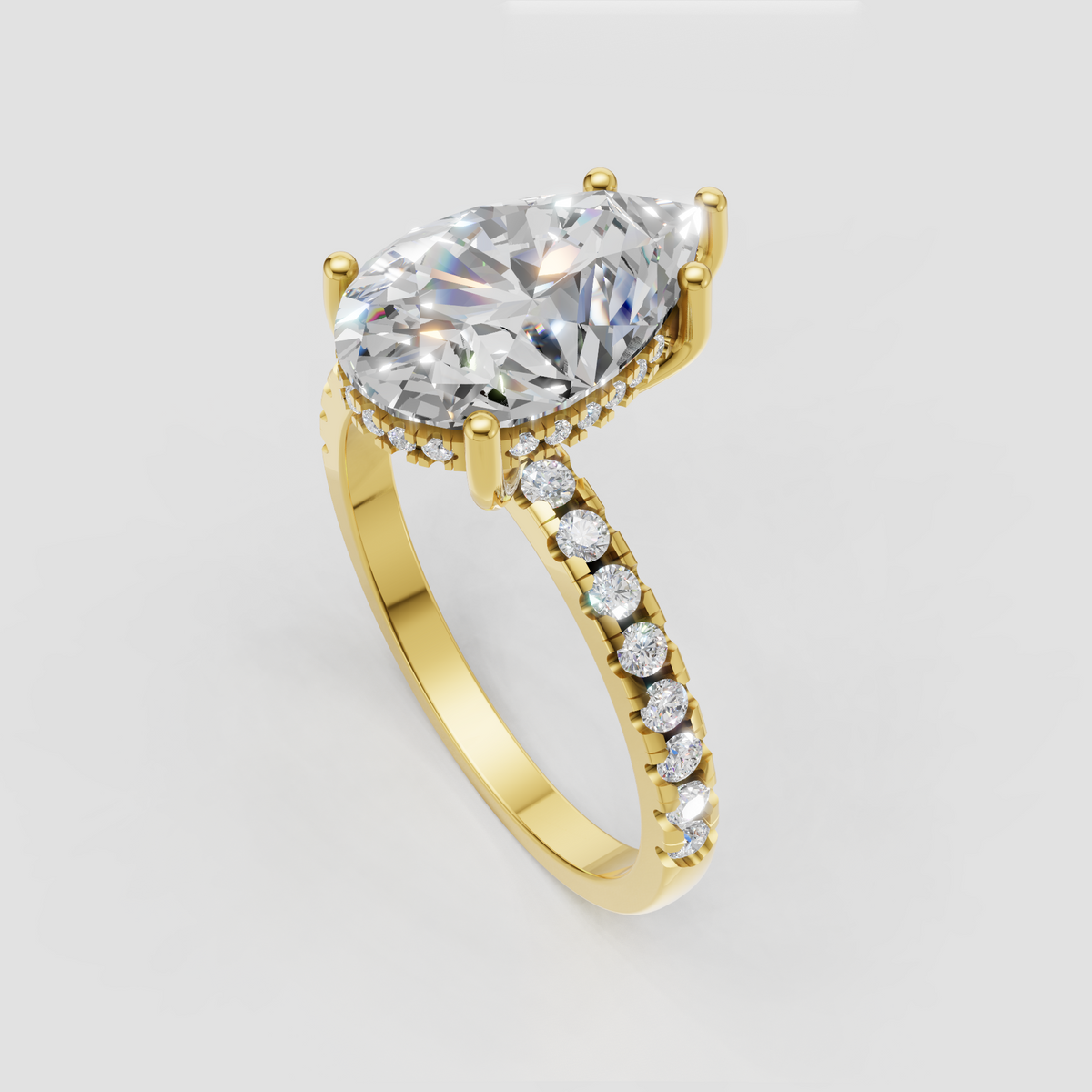 Yellow gold pear diamond engagement ring
