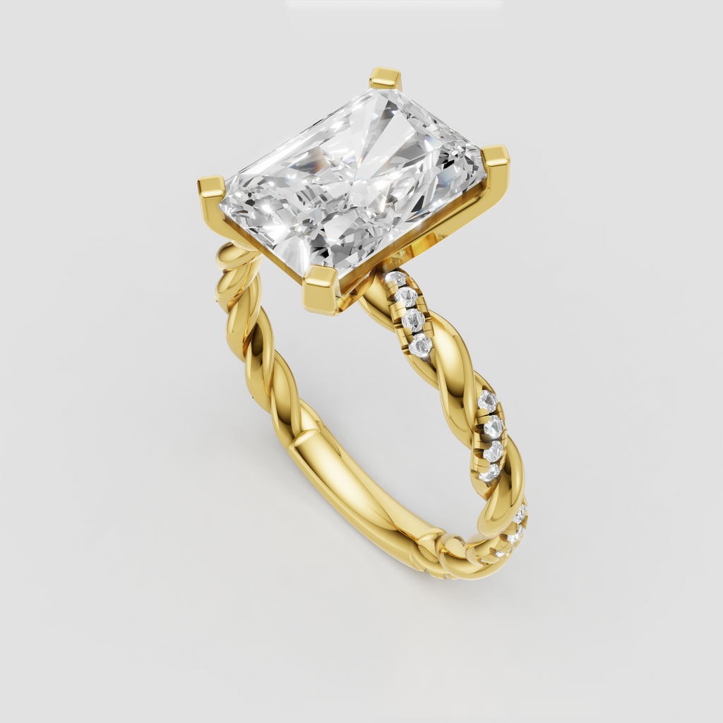 Radiant cut diamond ring with twisted braided gold band