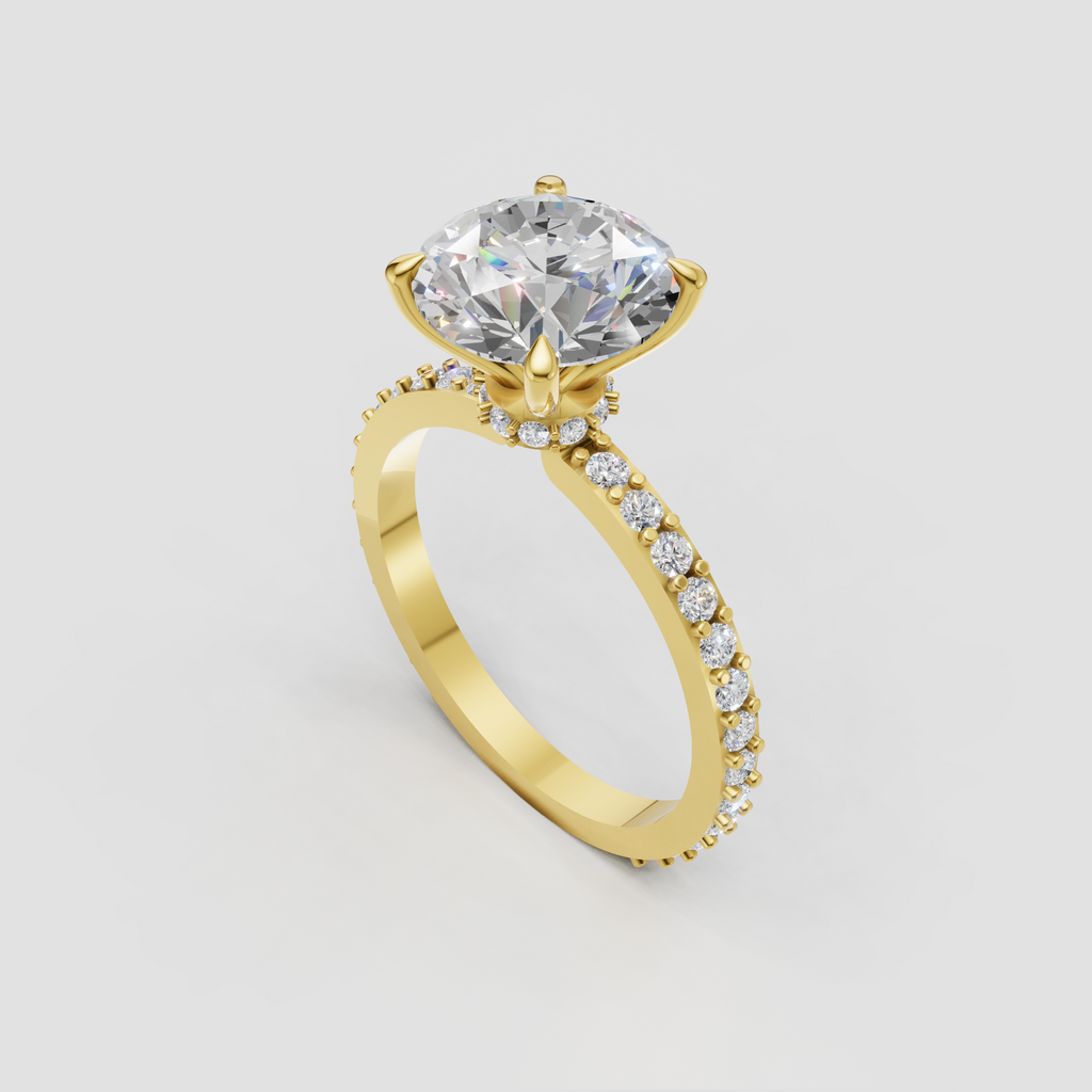 Round diamond engagement ring featuring four prong setting and hidden halo