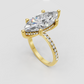 Marquise cut diamond ring with sparkling pave band