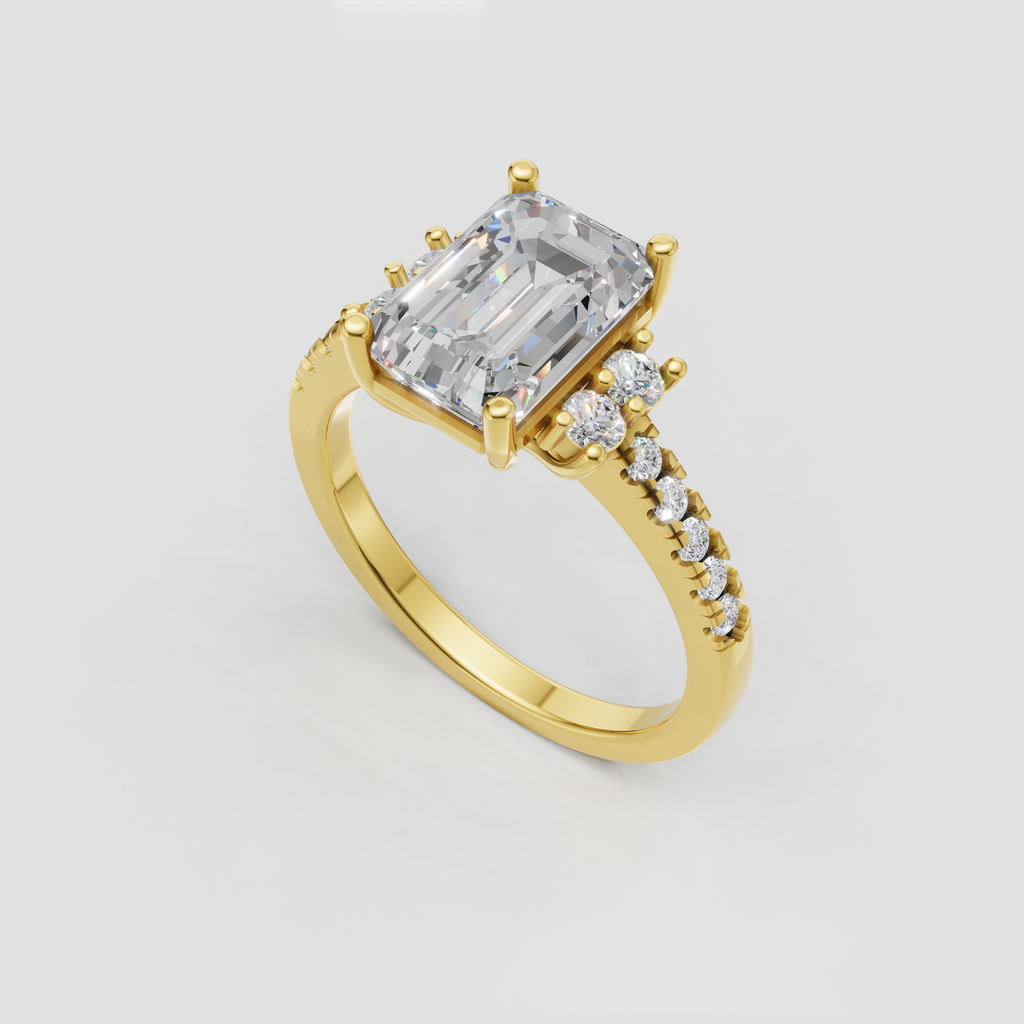 Emerald cut diamond ring with round side stone clusters