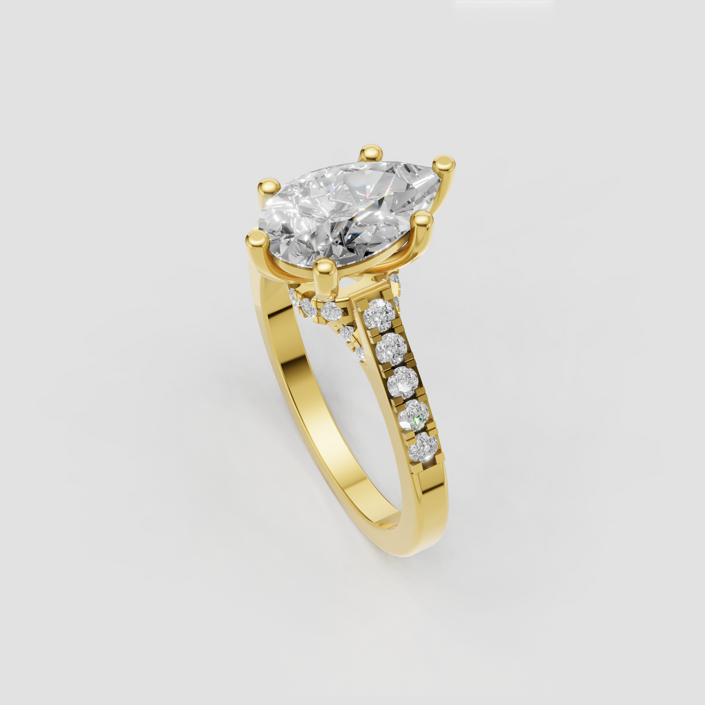 Pear shaped diamond ring featuring a V-shaped split shank with sparkling diamond accents