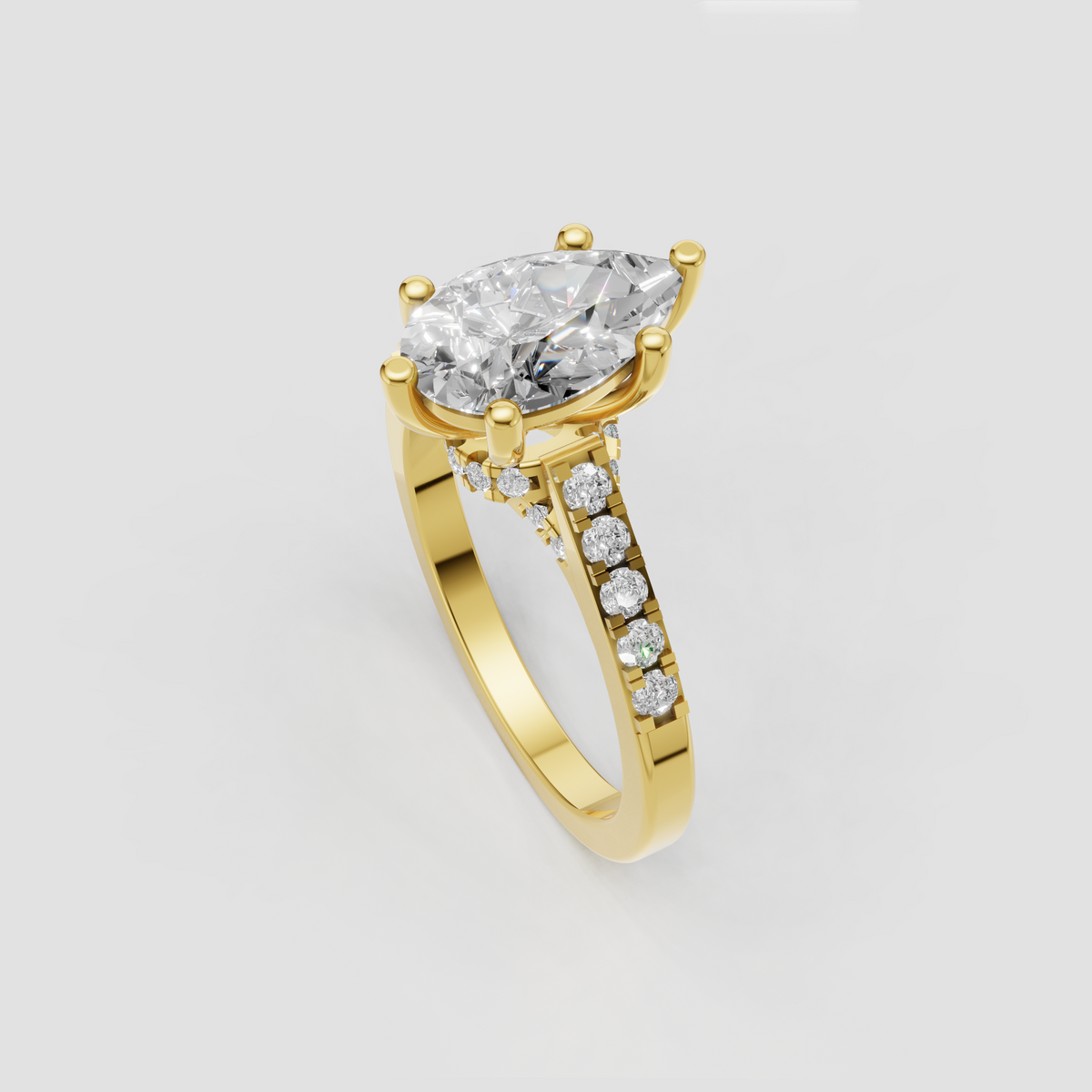 Pear shaped diamond ring featuring a V-shaped split shank with sparkling diamond accents