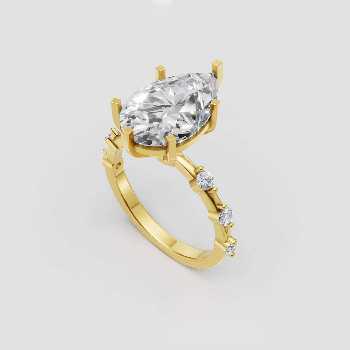 Pear shape diamond engagement ring in polished yellow gold