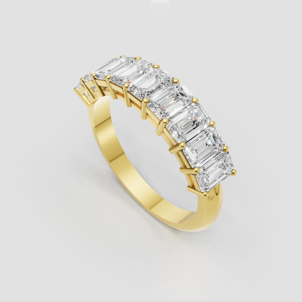 Emerald cut diamond eternity band with shared prong setting