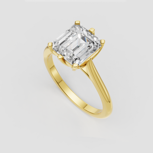 Emerald cut diamond cathedral engagement ring with crossover shoulders
