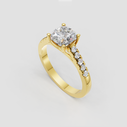 Yellow gold cushion cut diamond engagement ring with pavé shoulders
