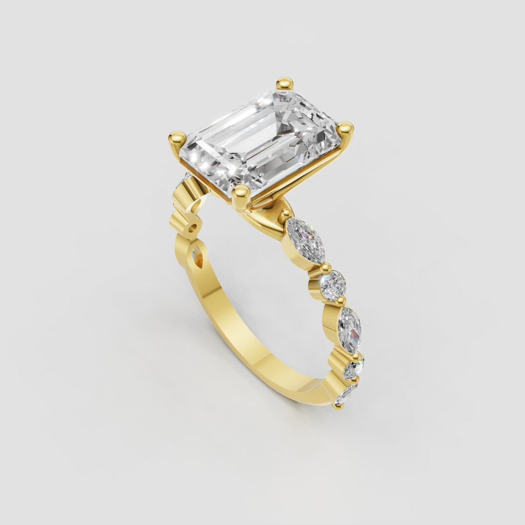 Emerald cut engagement ring with split shank and side stones