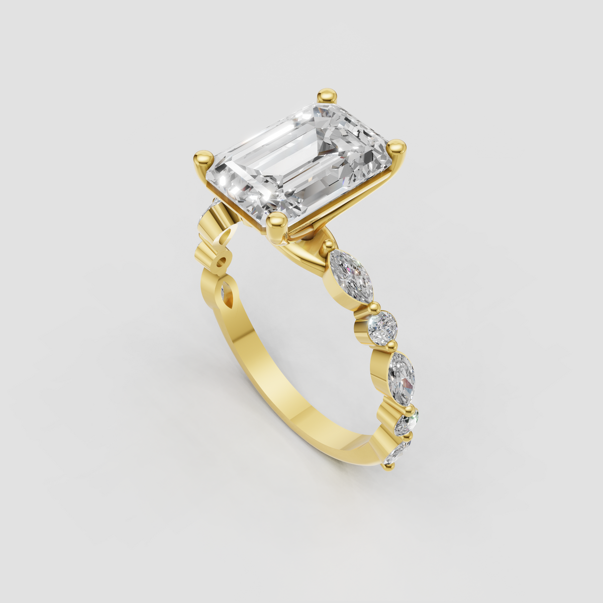 Emerald cut engagement ring with split shank and side stones