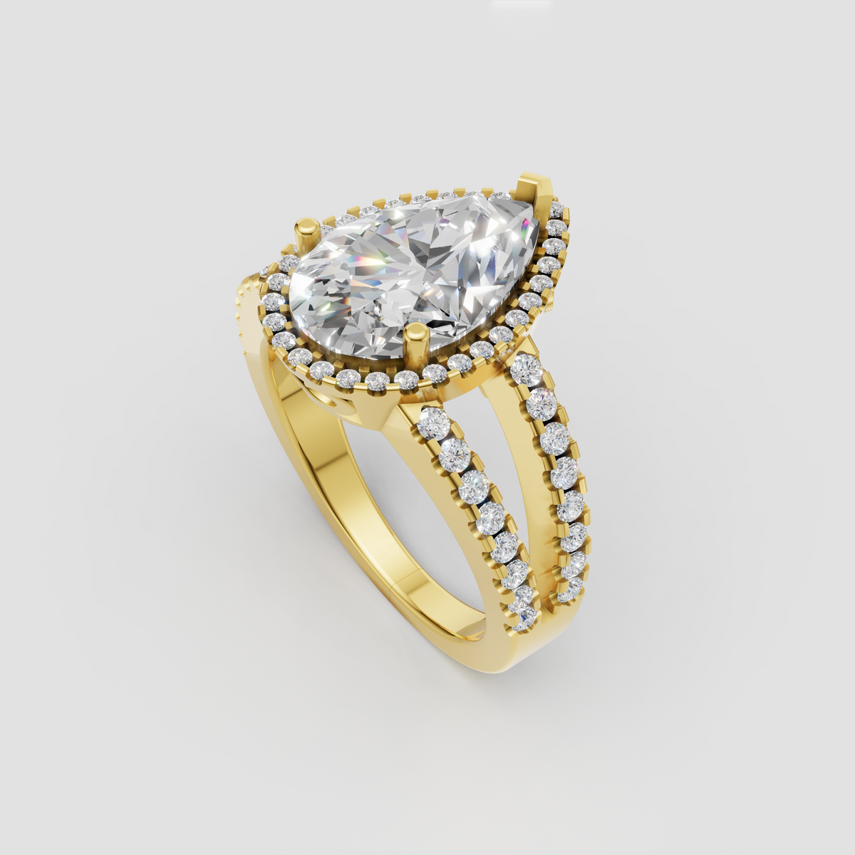 Pear shaped diamond engagement ring in polished yellow gold