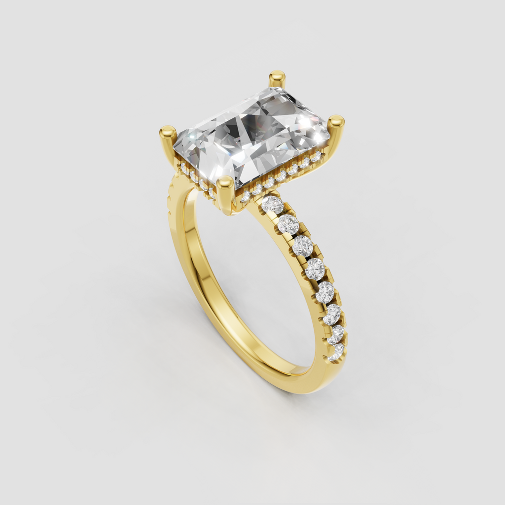 Radiant cut diamond ring with four-prong hidden halo setting